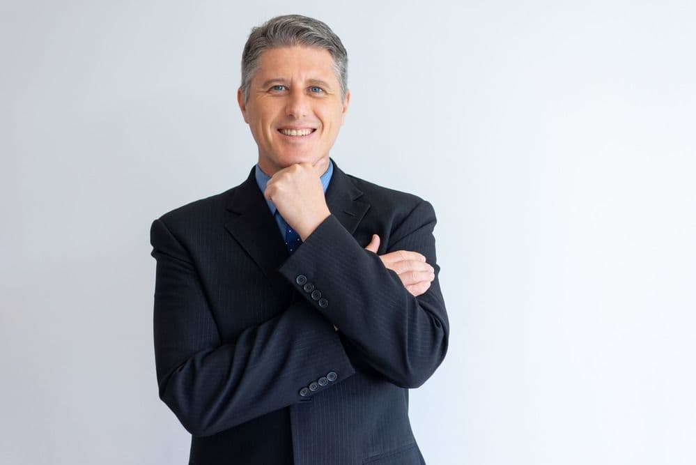 portrait-positive-confident-businessman (1).jpg