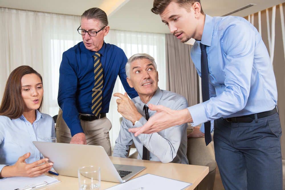 five-business-people-discussing-ideas-actively (2).jpg